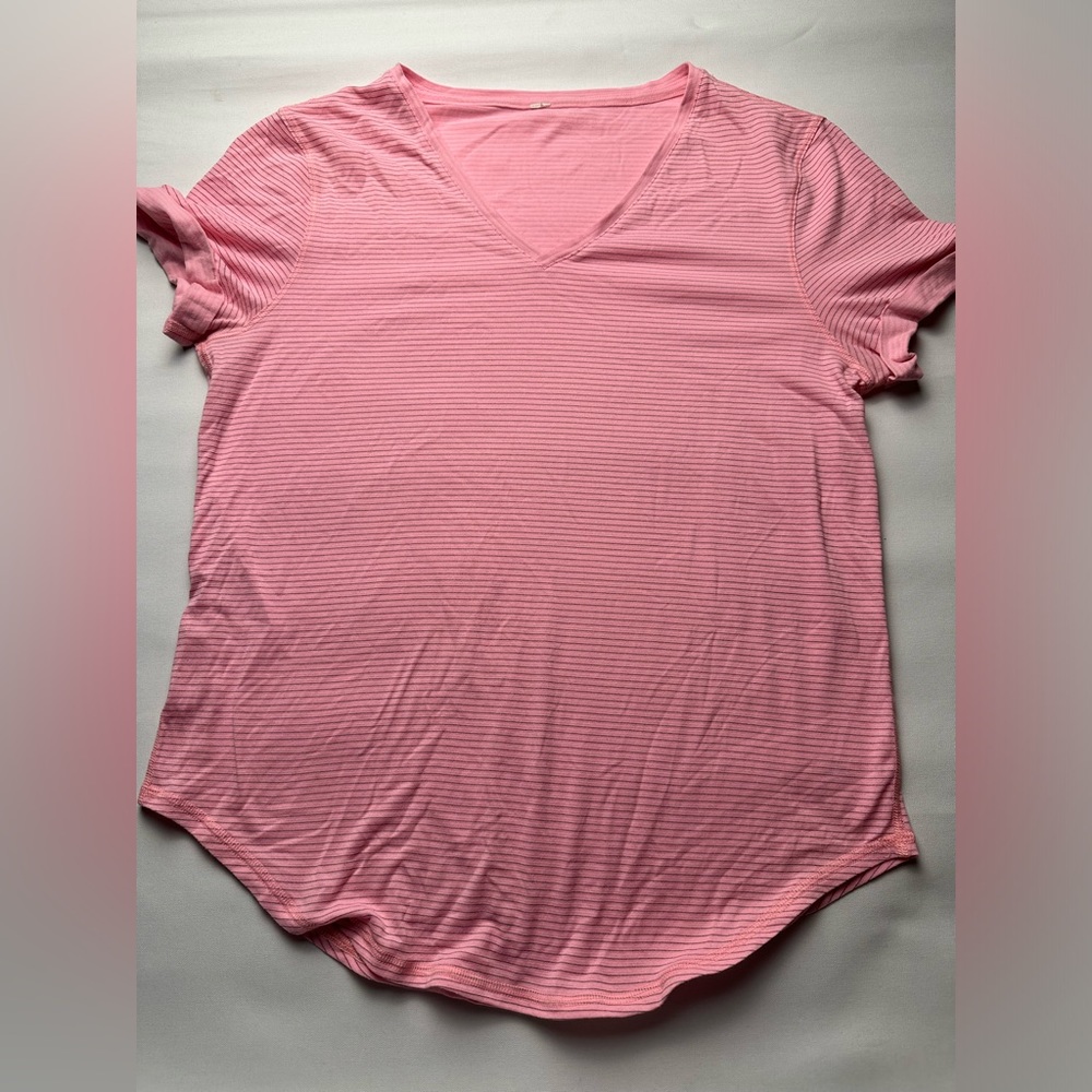 Pink and grey stripe Lululemon t shirt. No tag. Est size 8 see measurements.